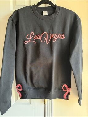 Black Crewneck Sweatshirt with Pink Las Vegas Script and Bow Accents